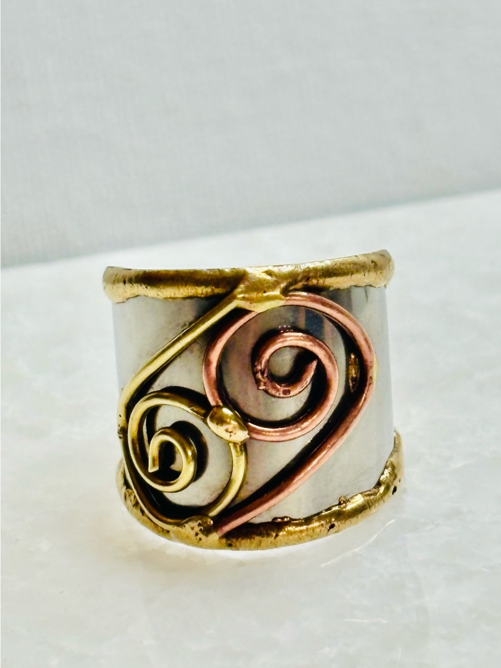 Modernist Mixed Metal Ring Stainless steel base with copper and brass texture